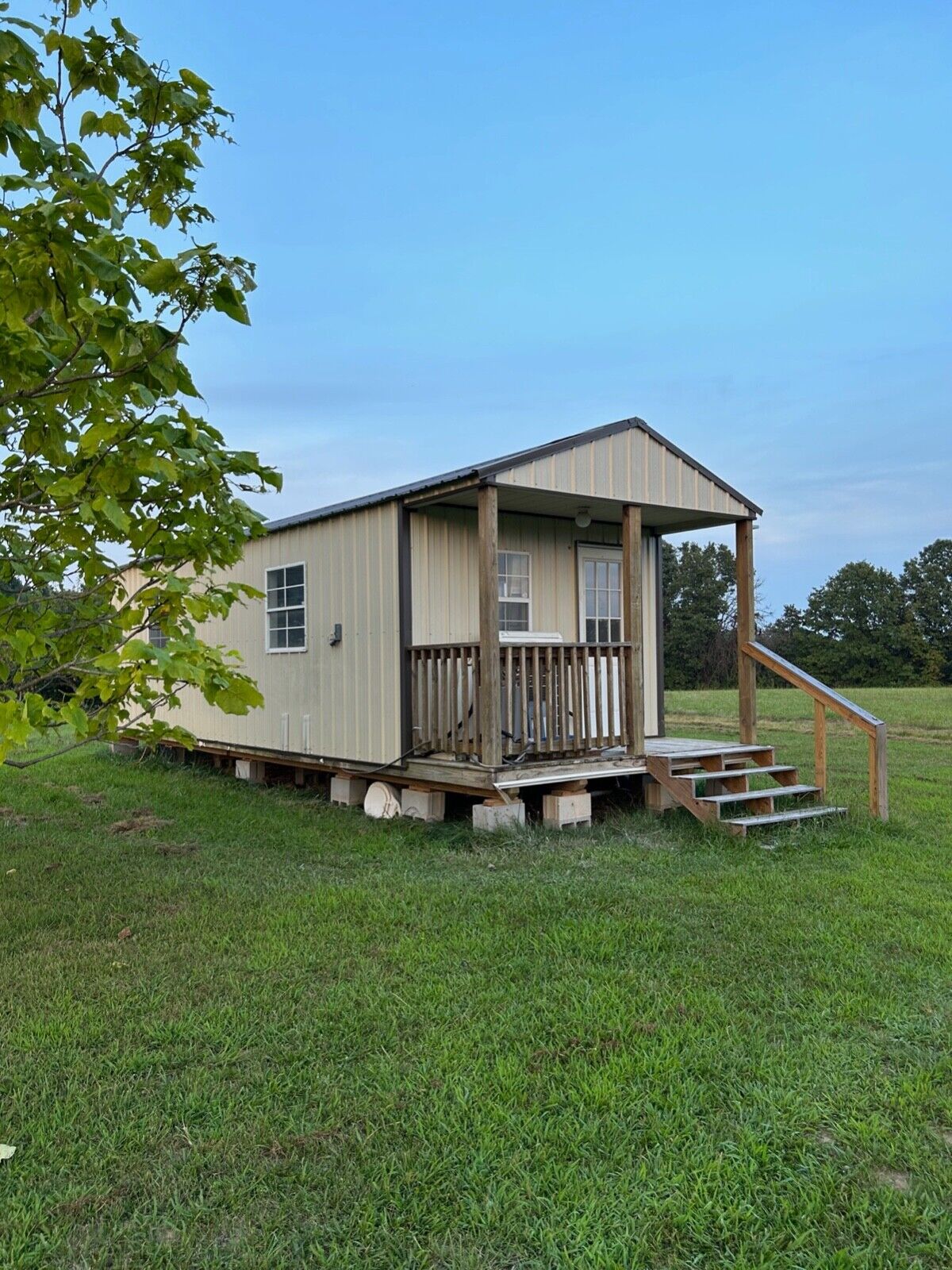 Unfinished Tiny house for sale 12 x 32 ft with 4′ porch Derksen home $27,500