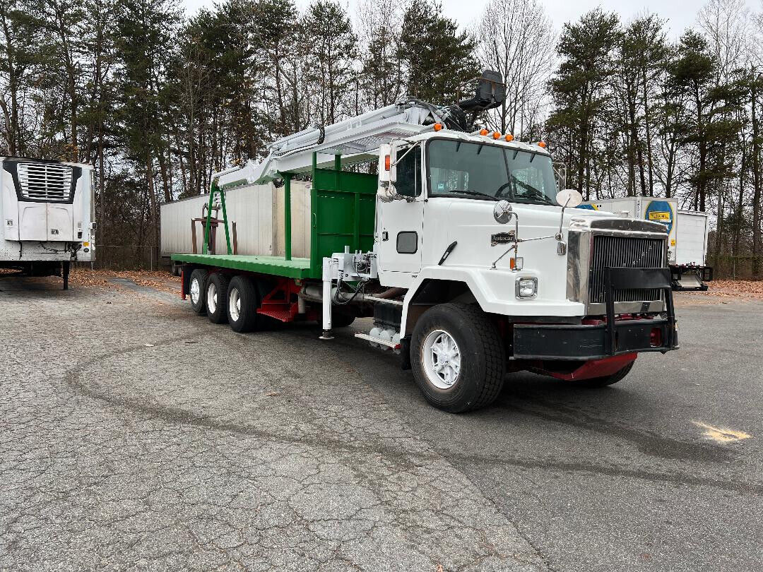 Beautiful 1997 Volvo -Autocar with Cormach 92 ft crane, optional grapplesaw