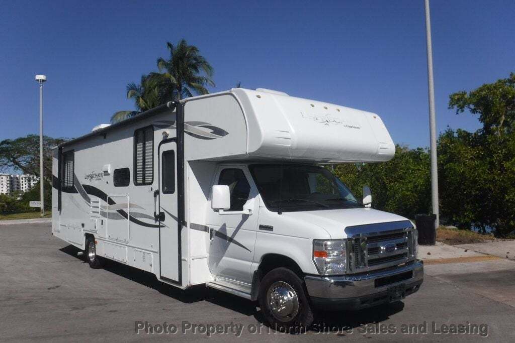2012 Coachmen Leprechaun 319DS Outdoor Kitchen and Entertainment Fire Place More