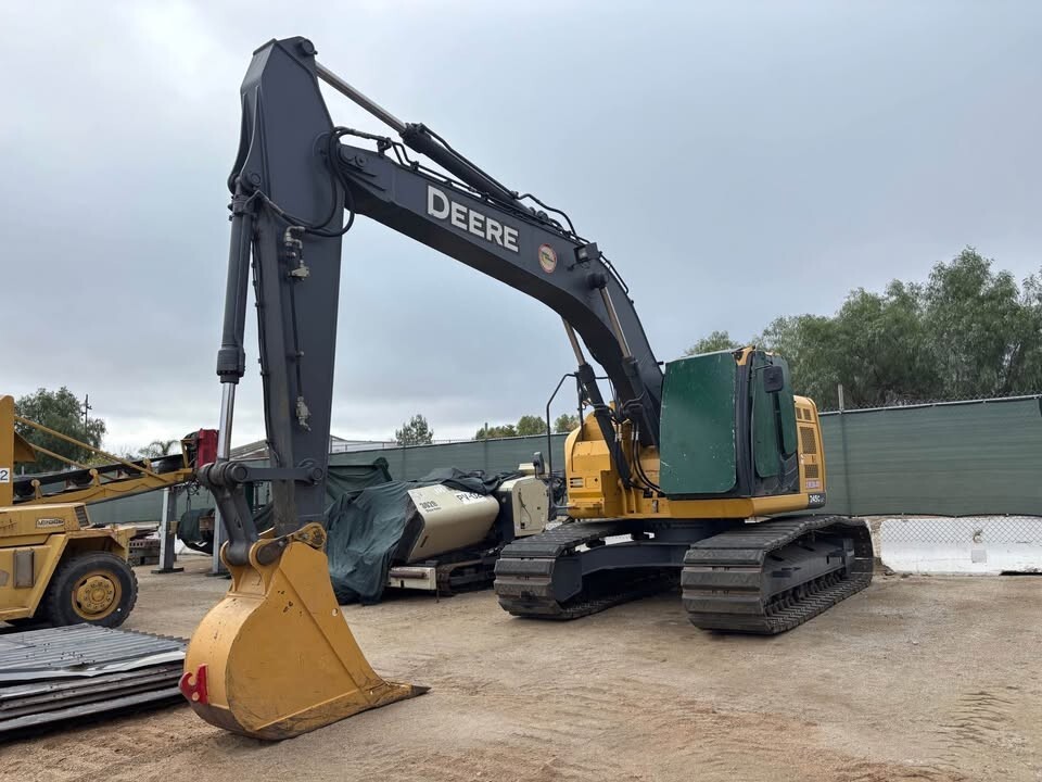2015 Deere 245G hydraulic excavator with hyd thumb, 3 buckets and 2 wheels