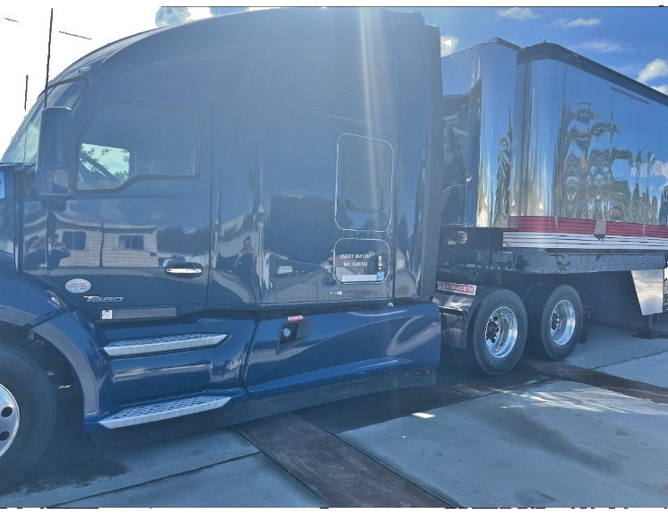 2019 kenworth t680 with 1985 Michelin 48 ft 3-car Stacker race trailer