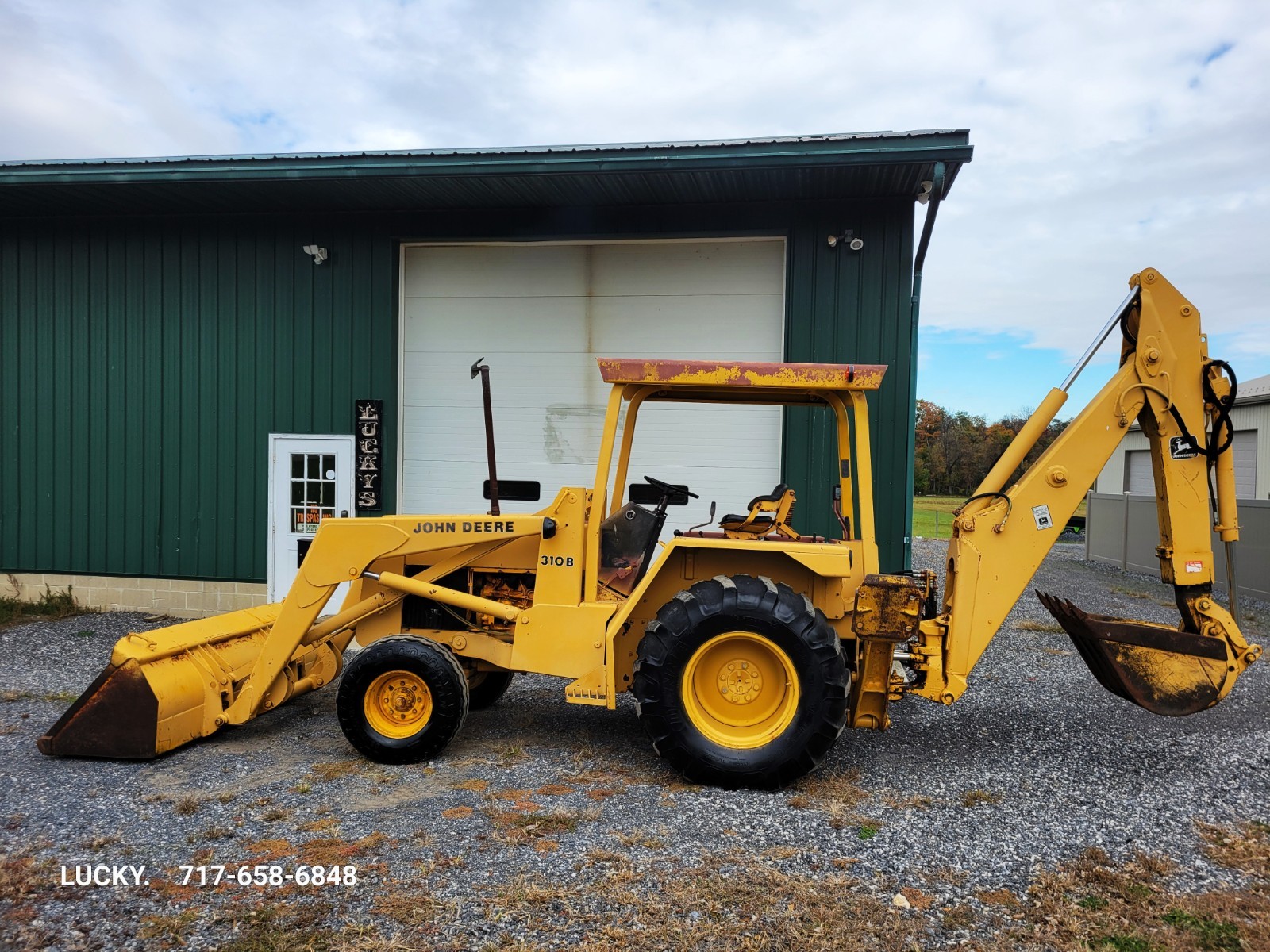 John Deere 310B Tractor Loader Backhoe Extend a Hoe