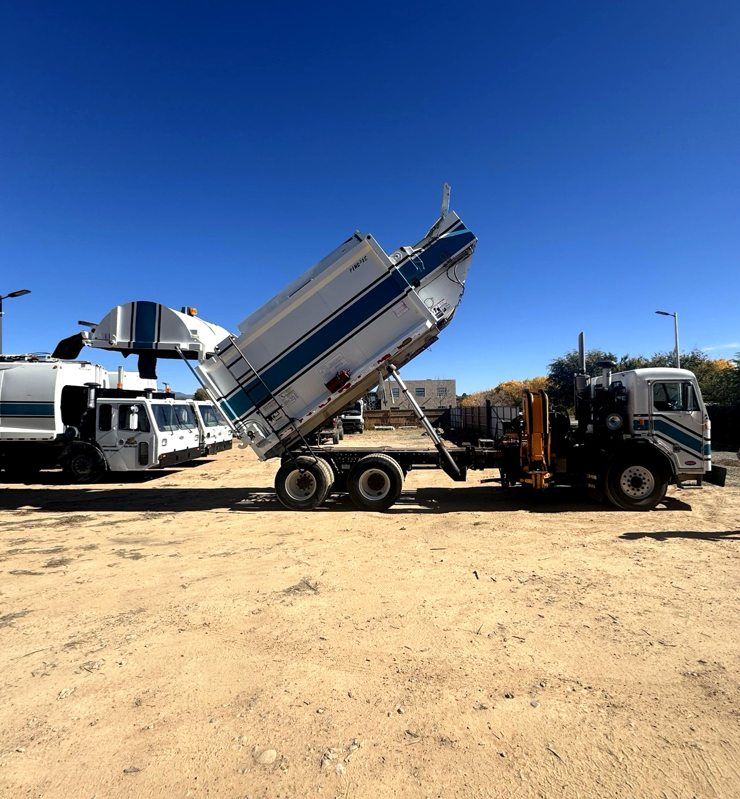 2012 PETERBILT 320 TRUCK 107,602 MILES RUNS AND DRIVES, PENDPACK SIDE GRABBER