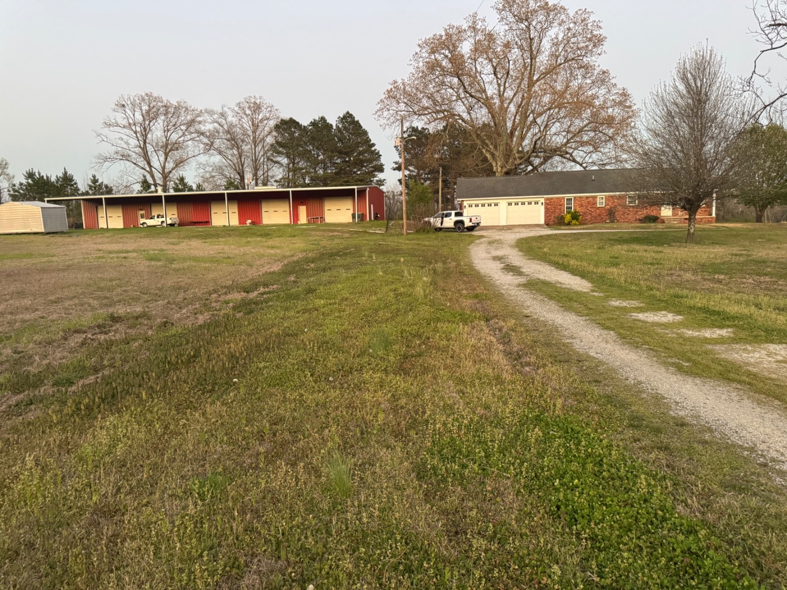 Commercial shop and brick house approximately 3 to 3 1/2 acres land