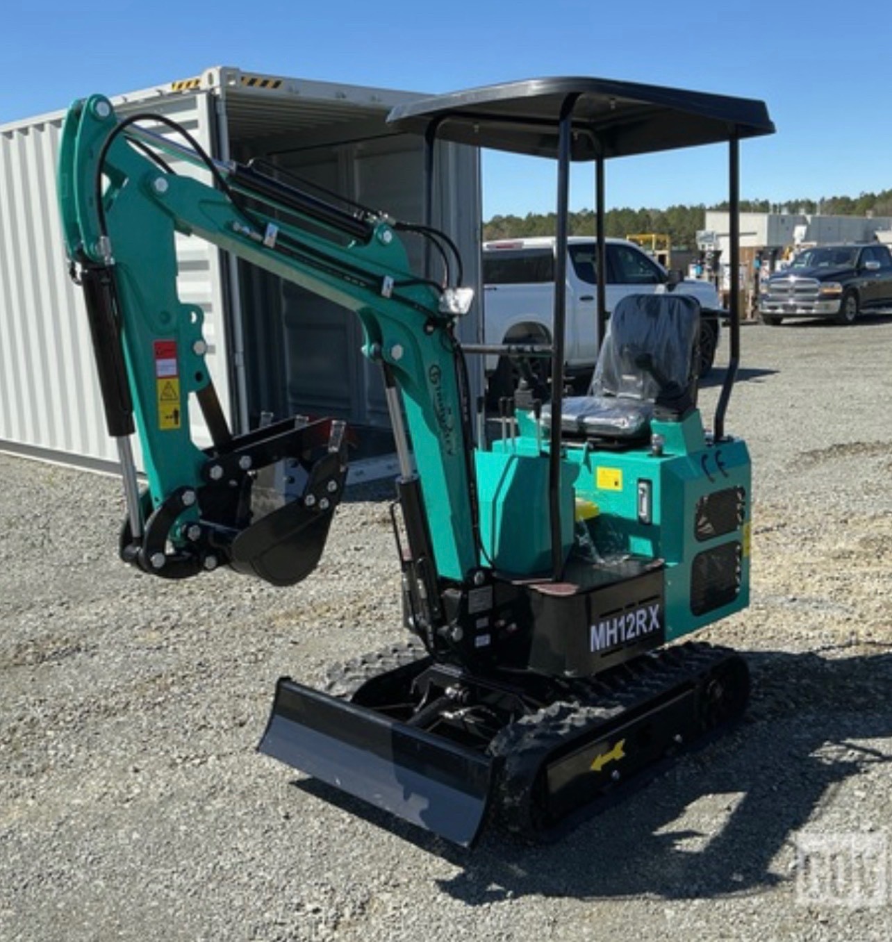 Mini excavator, mini front end loader, 4 mini dumpers, excavator attachment